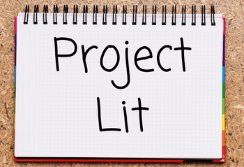 Notebook with text that says "Project Lit"